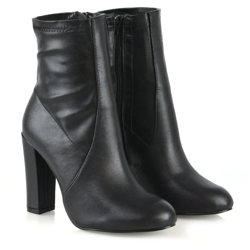 Margot Block High Heeled Zip-up Sock Ankle Boots in Black Synthetic Leather